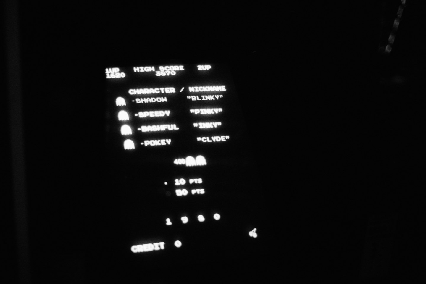 Tela de fliperama de Pac-Man com a lista de pontuações.